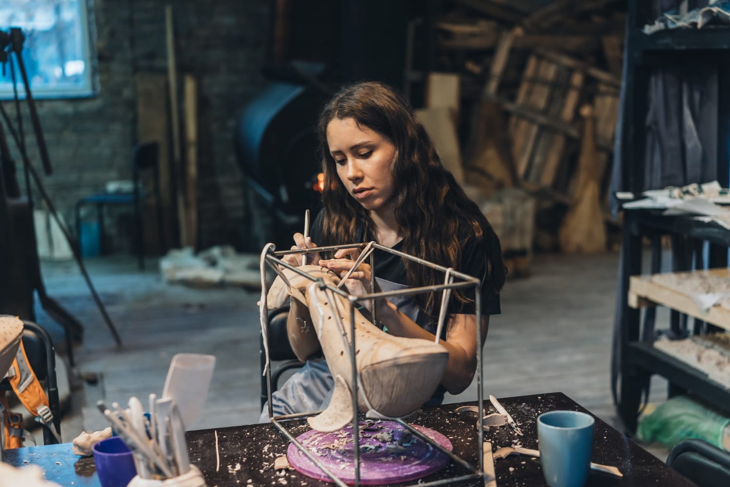 portrait-young-woman-enjoying-favorite-job-workshop-potter-carefully-works-clay-whale_upload